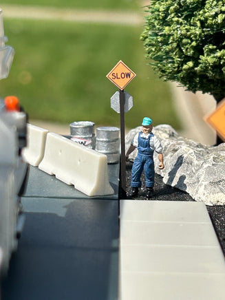 š¢ Flagger Stop & Slow Sign| ScaleSigns.com